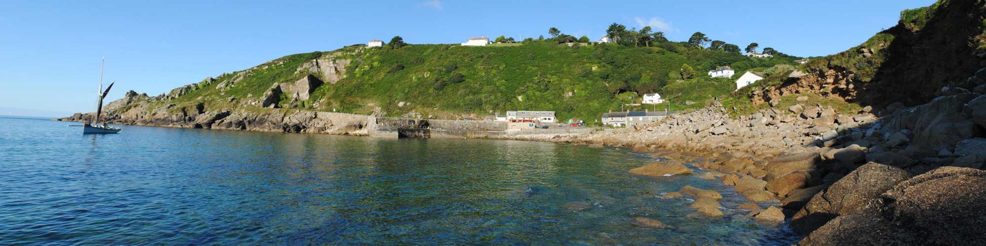 A scenic view of Lamorna Cove with clear waters