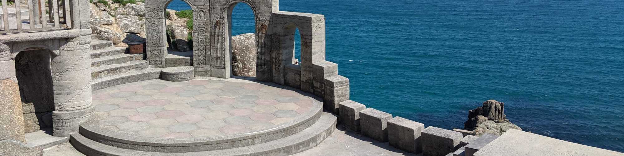 The Minack Theatre stage with the sea in the background